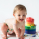 happy baby at a cake smash photoshoot